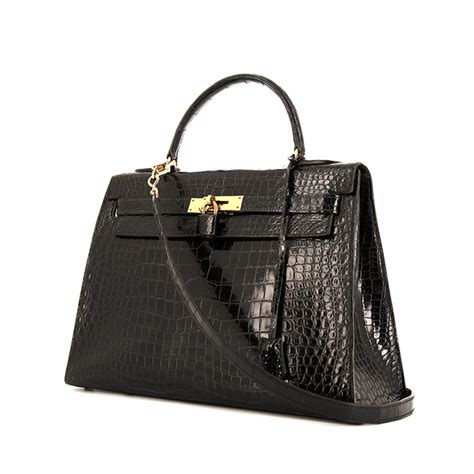 HERMÈS Bolso Kelly de 32 cm en cocodrilo porosus negro,